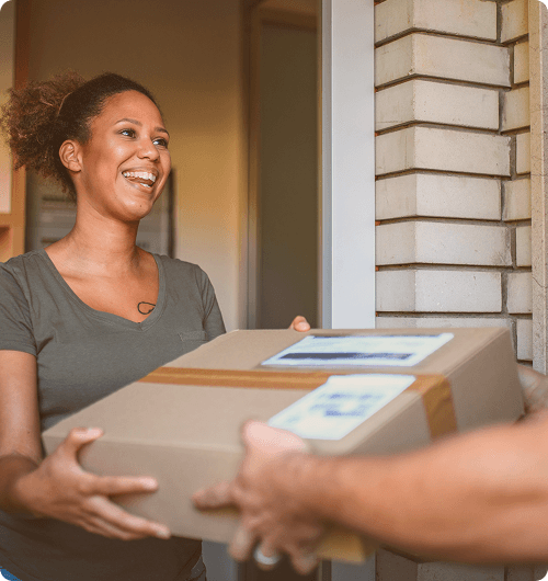 happy customer receiving parcel thanks to Addressfinder services