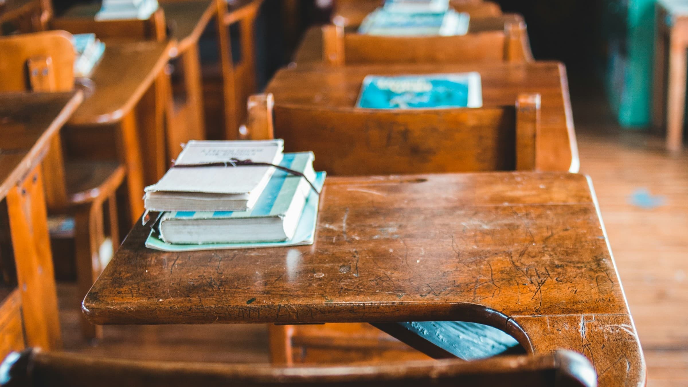 school desk with books