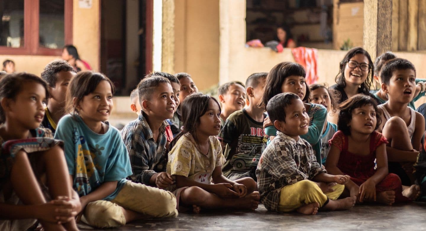 children sitting on floor