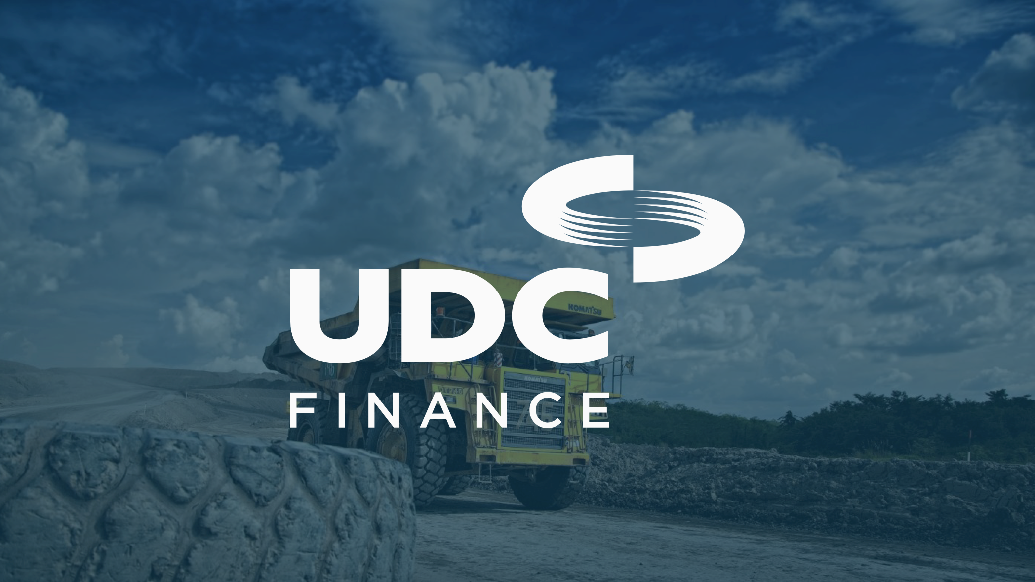 UDC Finance logo with truck in background