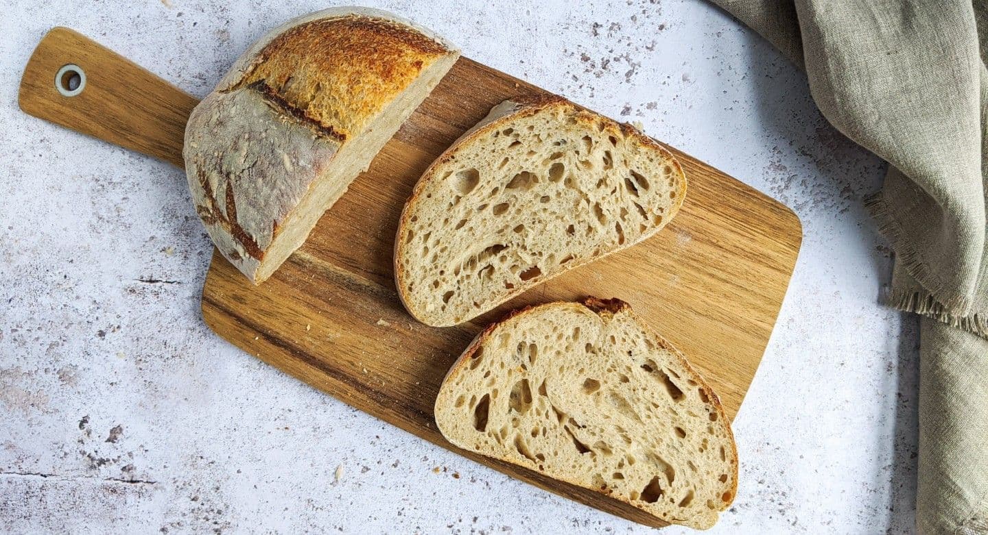 freshly baked bread on a chopping board