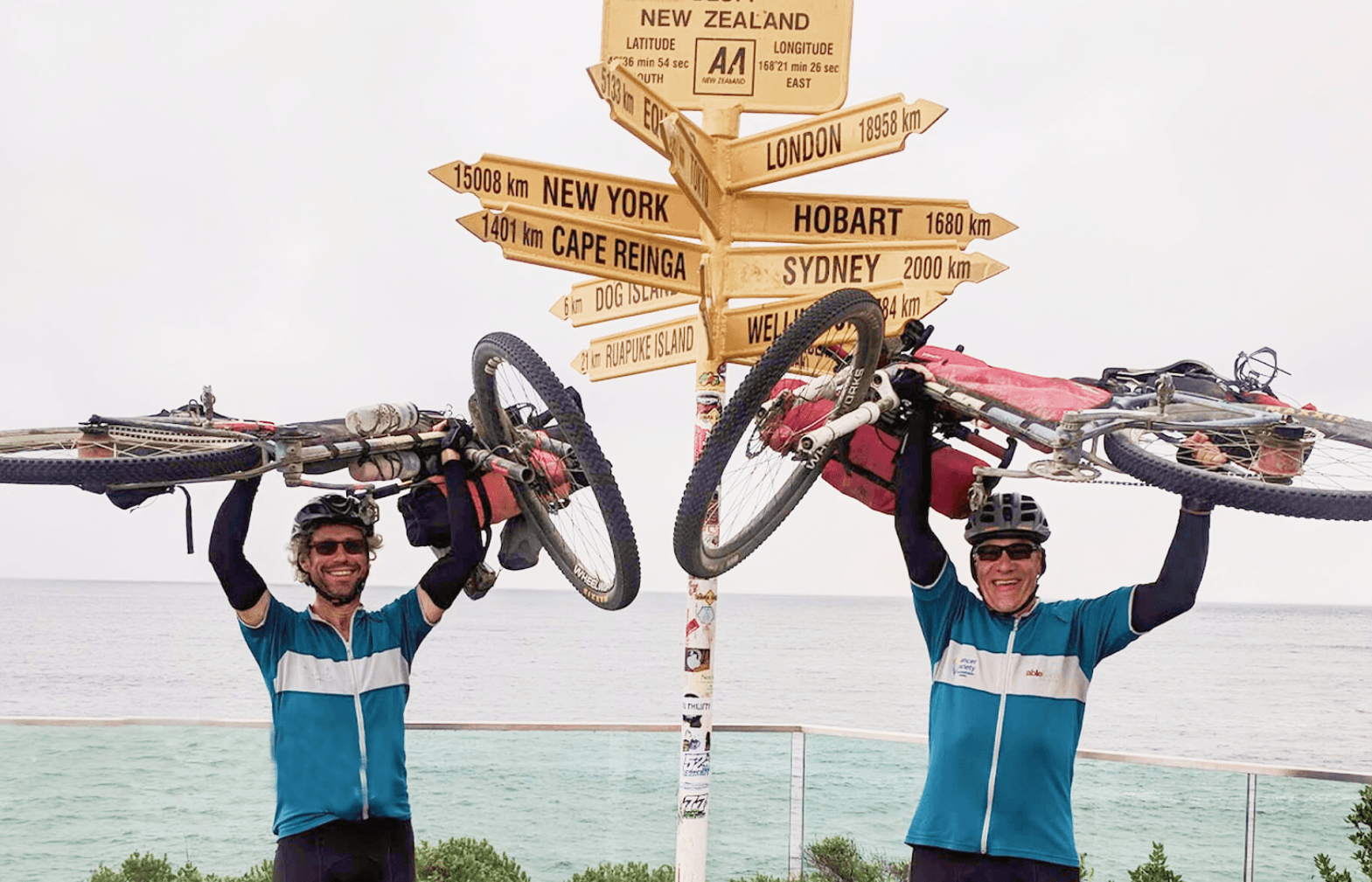 Marcus and Carl, Addressfinder founders finishing tour de Aotearoa on bikes